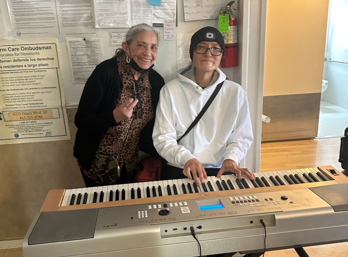 Residents enjoying music together at Janet's