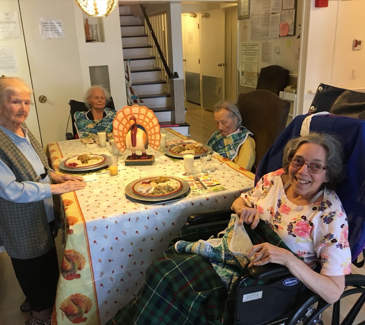 Residents celebrating together at a holiday gathering