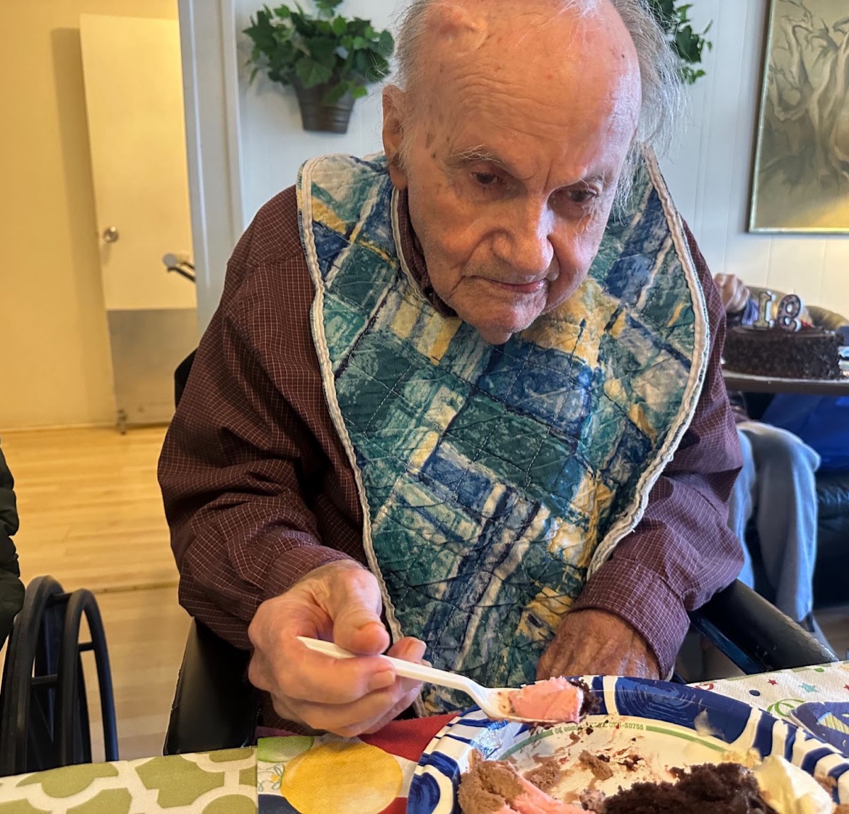 A resident enjoying a meal